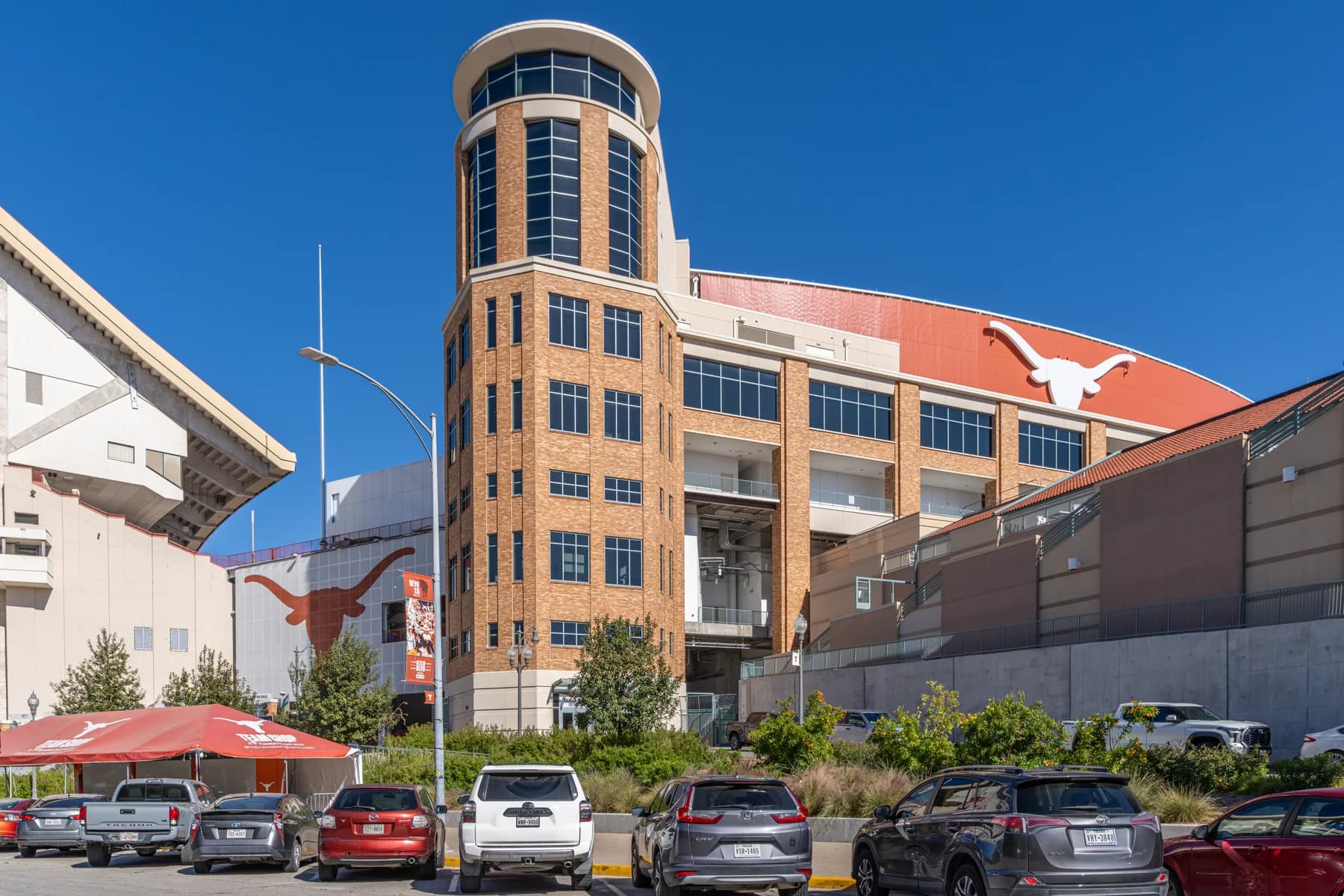 Burnt-orange Longhorns signage on the outside of DKR stadium in Austin